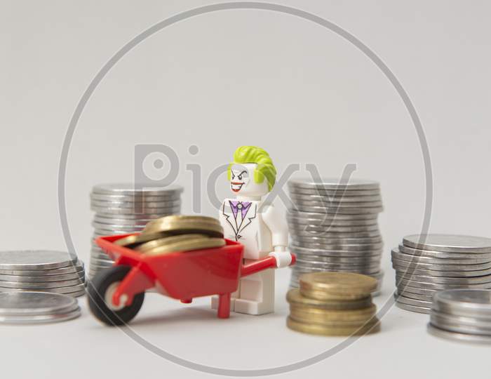 Joker Minifigure Stealing Money, Carrying Coins On A Wheelbarrow