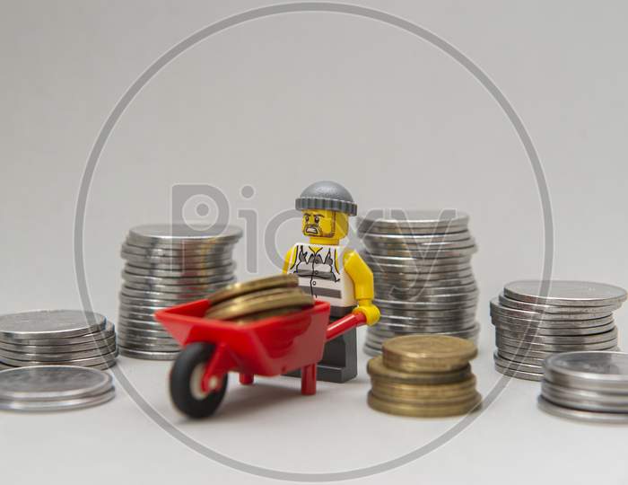 Minifigures Of Bank Robbers Stealing Money.Thieves Carrying Coins.