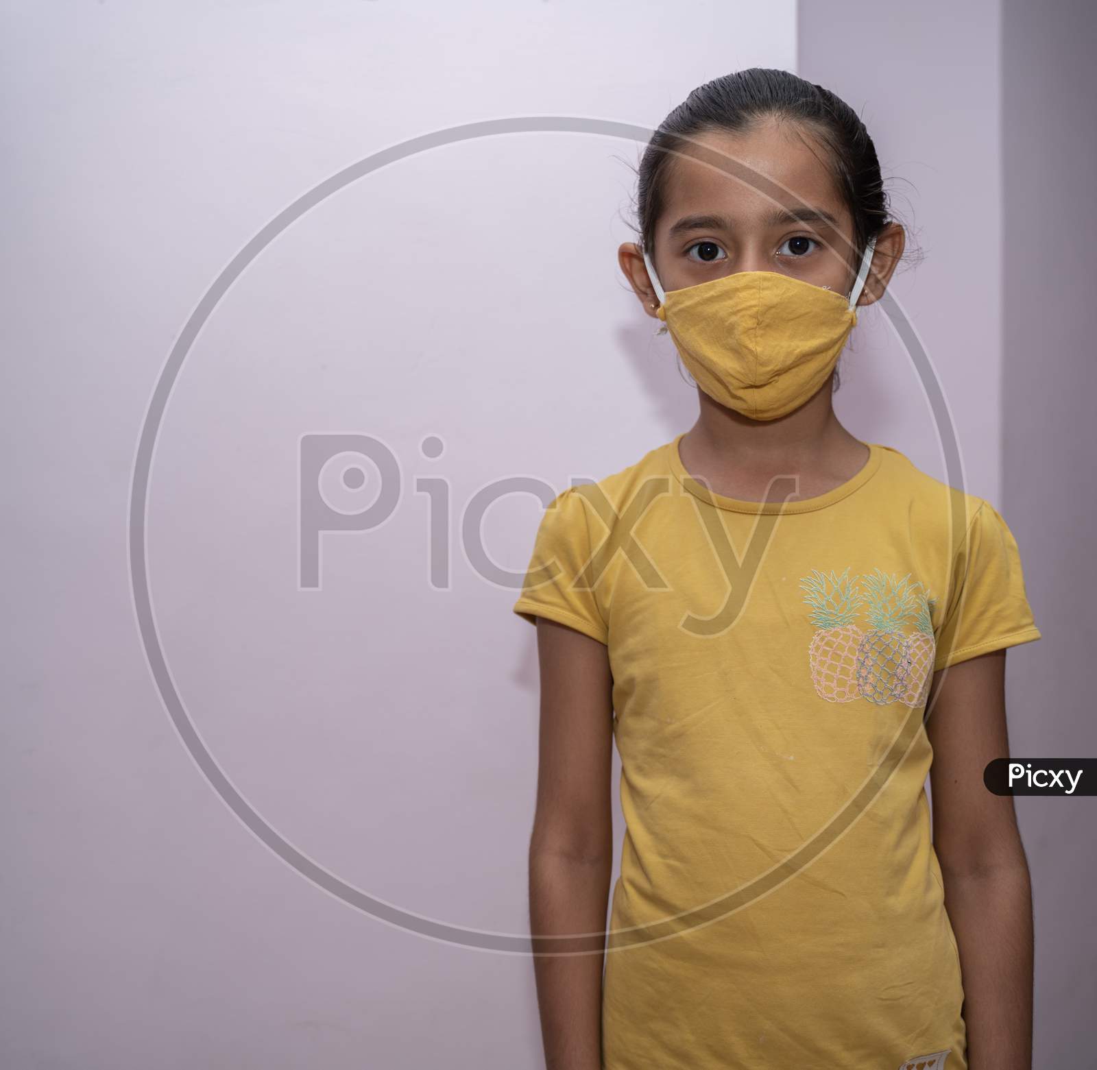 jaipur . Rajasthan . India - June 12, 2020. Asian girl wearing protective face mask Protect from the corona virus or Coronavirus covid-19