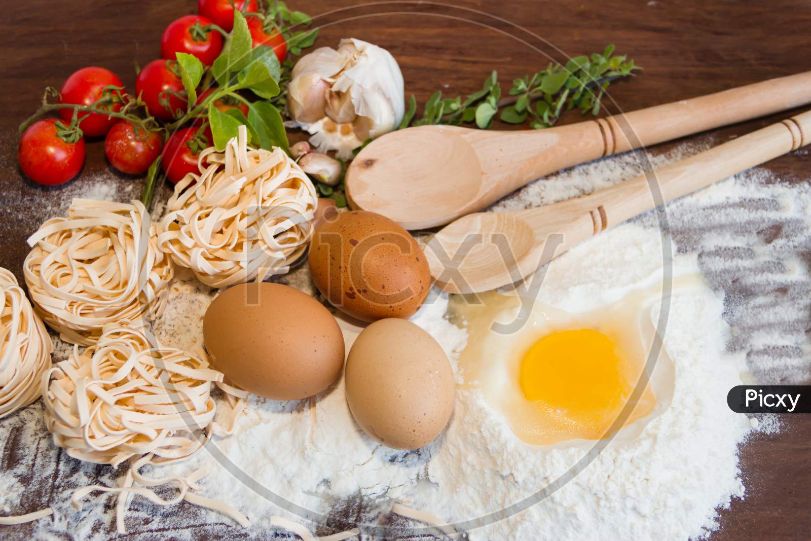 Ingredients Preparation Spaghetti With Eggs, Tomatoes Herbs And Spices