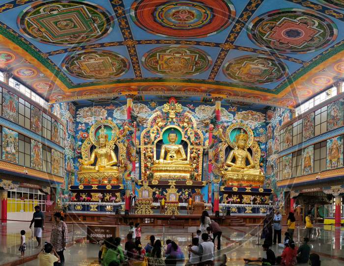 July 8, 2019 - Karnataka, India: Panorama Of Interior Of Namdroling Monastery In Coorg District, Karnataka, India. It Is Also Known As Golden Temple And Is A Buddhist Monastery. Statue Of Buddha.