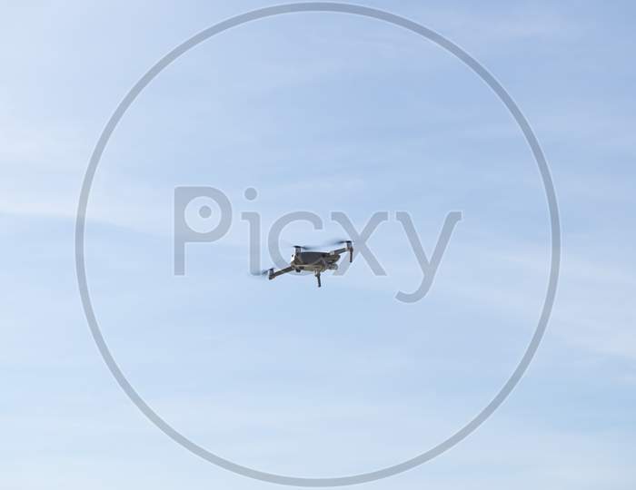 Drone Flying Over Landscape With Digital Camera