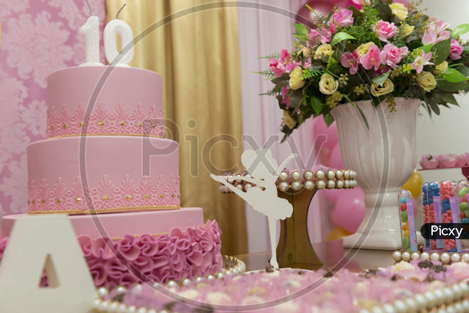 Pink Kids Girly Birthday With Candies And Flowers.