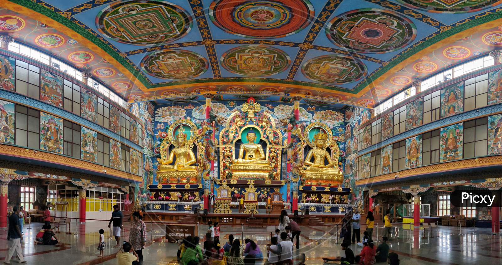 July 8, 2019 - Karnataka, India: Panorama Of Interior Of Namdroling Monastery In Coorg District, Karnataka, India. It Is Also Known As Golden Temple And Is A Buddhist Monastery. Statue Of Buddha.