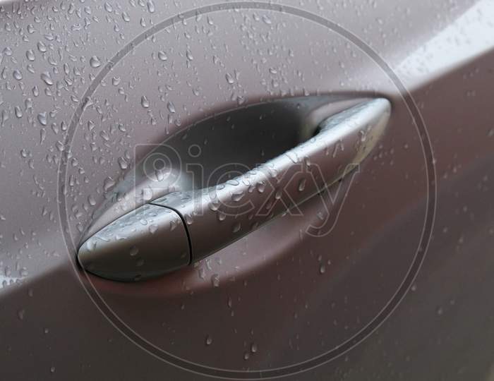 Car Door Handle In Rain