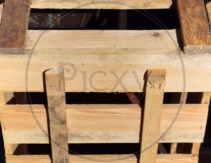 Very Old Wooden Crates With Some Cracks In A Close Up View