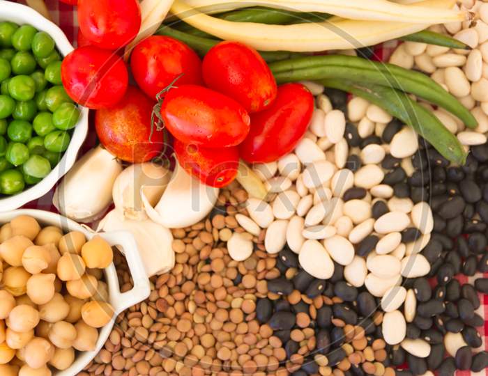 Variety Of Kitchen Ingredients With Fresh And Dried Legumes