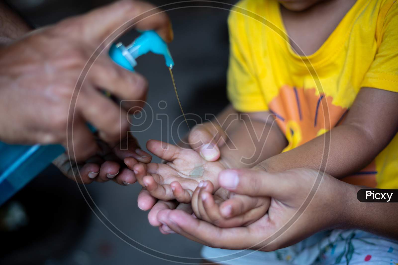 A Child Is Learning How To Clean Hands With Liquid Cleaning Gel. To Prevent Coronavirus, Rubbing Your Hands With Soap Is An Expert Way To Stop The Spread Of Coronavirus.