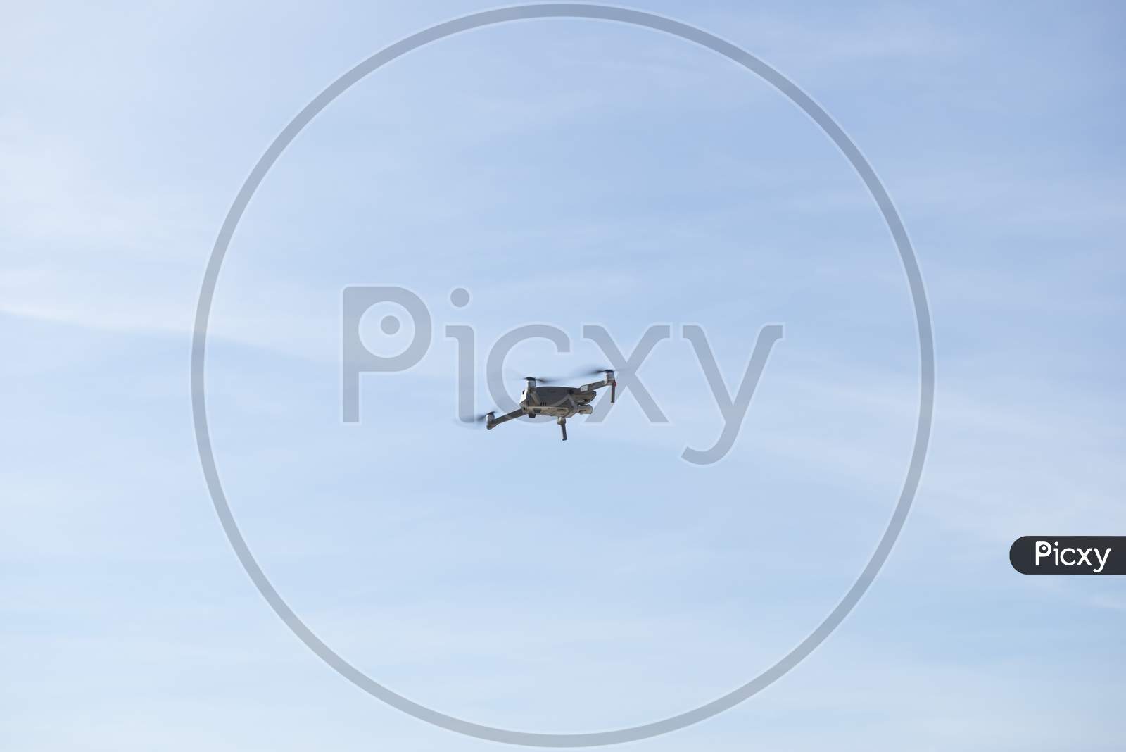 Drone Flying Over Landscape With Digital Camera