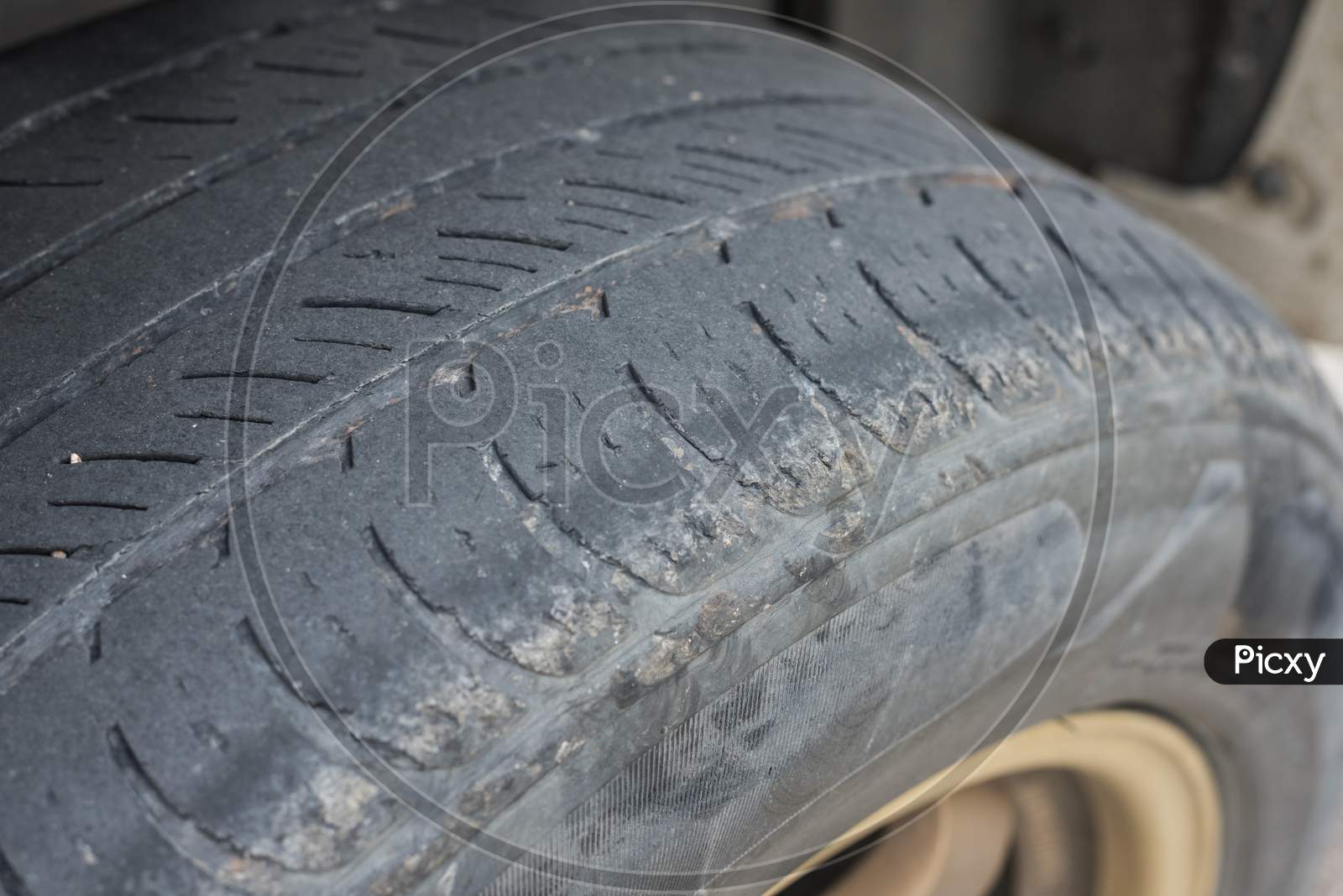 Close Up Of Old Tire Wheels. Automotive And Material Concept. Car And Vehicle Theme.