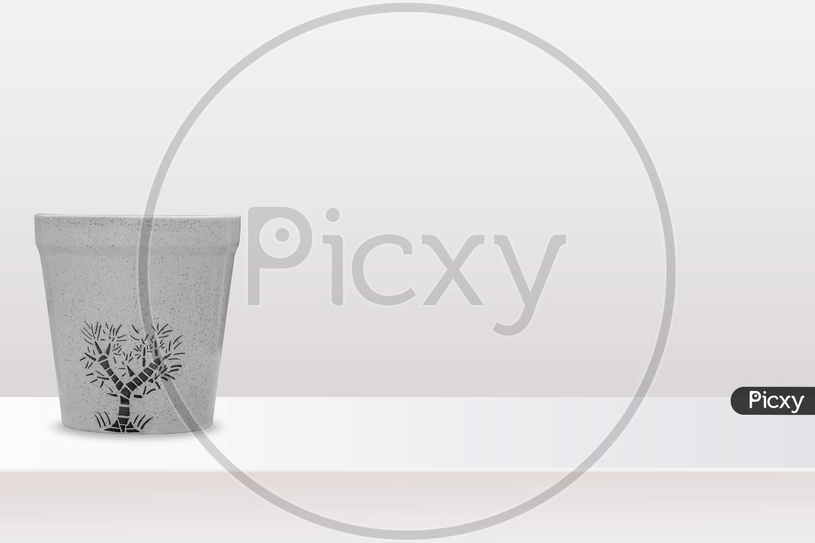 empty printed flower pot isolated on white background, copy space.