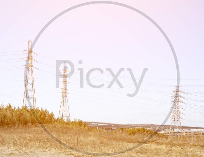 Power Line In Nature With Sun Light, Wide Screen, Technology And Nature Concept