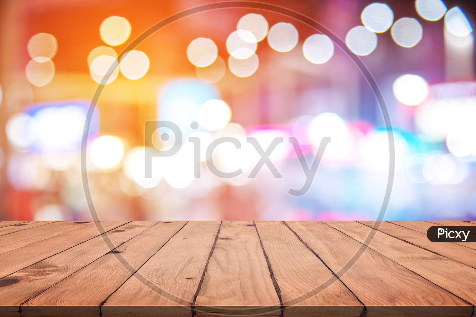 Empty Wood Table With Colorful Abstract Bokeh. Wallpaper And Texture Concept. City Light And Product Stage Showing Theme. Presentation Template