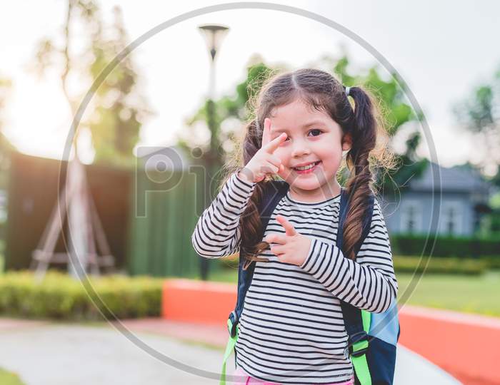 Happy Little Girl Enjoy Going To School. Back To School And Education Concept. Happy Life And Family Lifestyle Theme.
