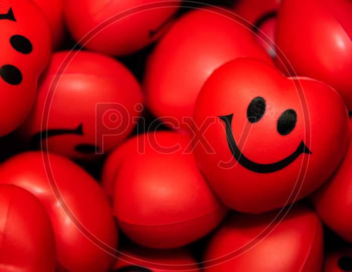 Many Smile Hearts Muscle Relief Massage Ball Background For Valentines Day And Love Romantic Concept. Positive Emotional Face For Gift Someone You Love As Surprised Present.