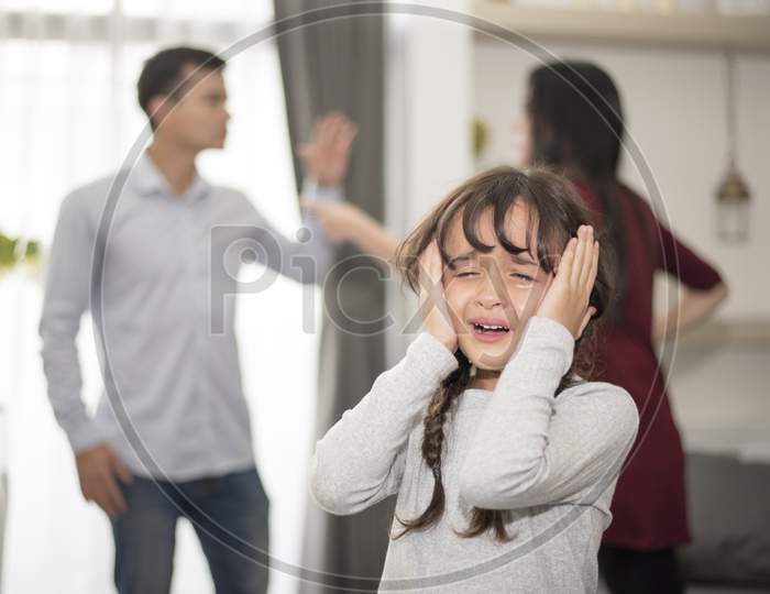 Little Girl Was Crying Because Dad And Mom Quarrel, Sad And Dramatic Scene, Family Issued, Children'S Rights Abused In Early Childhood Education And Social And Parents Care Problem Concept
