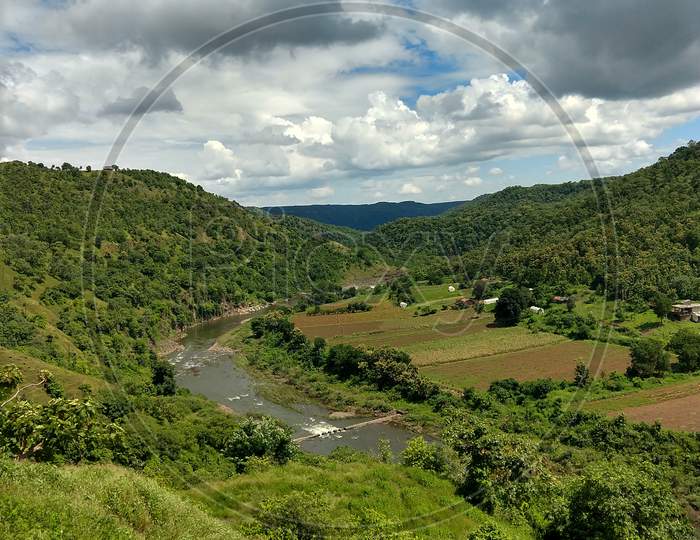 Landscape View Of A Valley With A Hilly River And Agriculture Field Of Madhya Pradesh, India