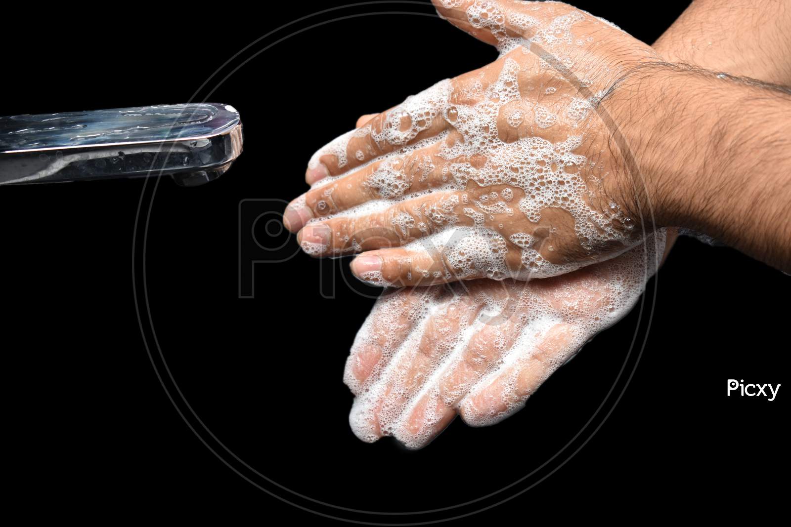 Man Washing Hands With Liquid Soap