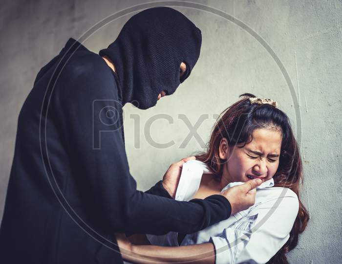 Robber Or Thief Force Woman To Take Off Her Clothes And Raping In Abandoned House. Criminal Sexual And Illegal Violence Crisis Concept. Social Issues And Problem Concept