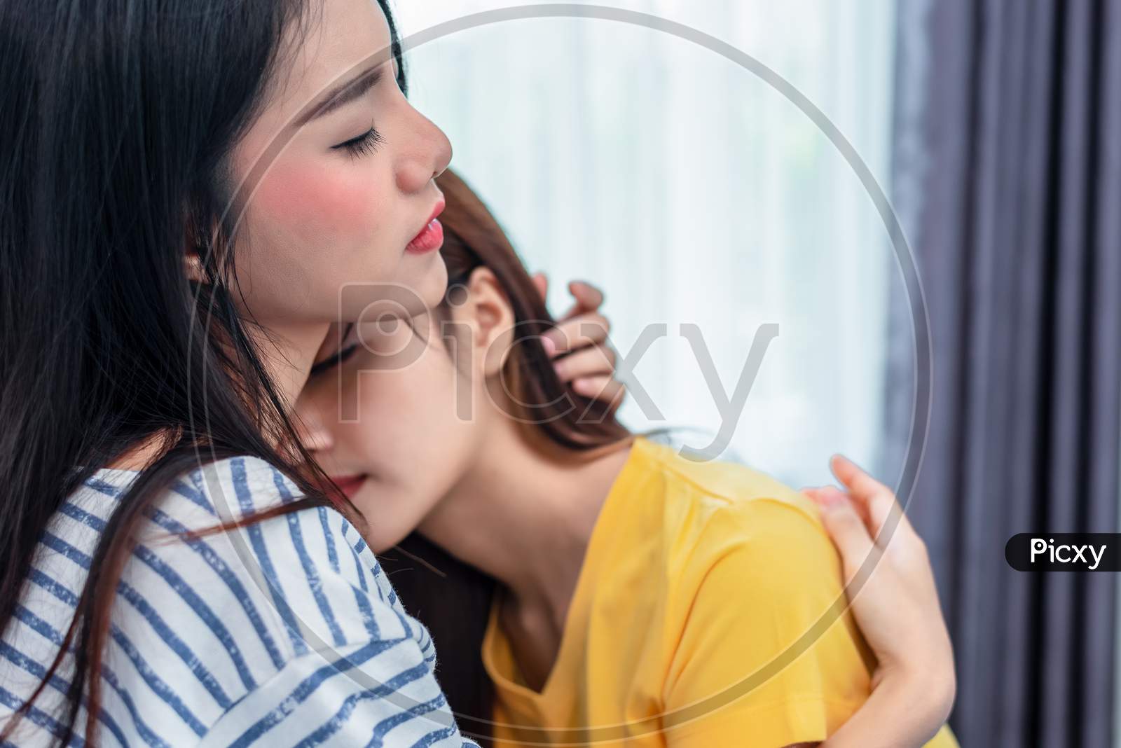 Image of Close Up Of Two Asian Lesbian Women Embracing Together In Bedroom.  Couple People And Beauty Concept. Happy Lifestyles And Home Sweet Home  Theme. Embracing Of Homosexual. Love Scene Making Of