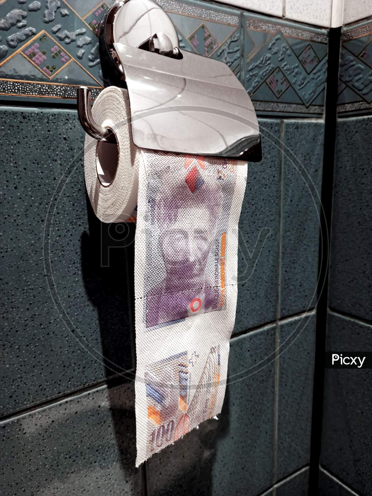 A toilet paper with a currency note imprinted on it, represents it's high demand and low supply during covid 19 pandemic