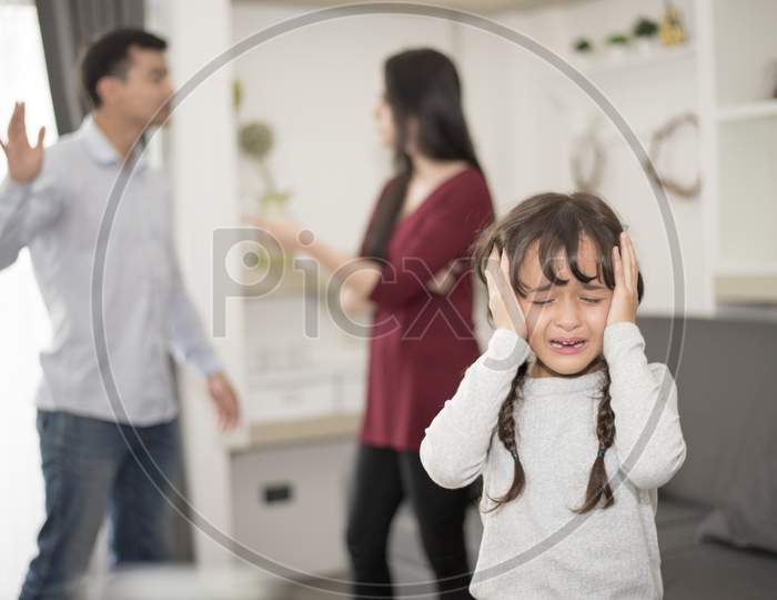 Little Girl Was Crying Because Dad And Mom Quarrel, Sad And Dramatic Scene, Family Issued, Children'S Rights Abused In Early Childhood Education And Social And Parrents Care Problem Concept