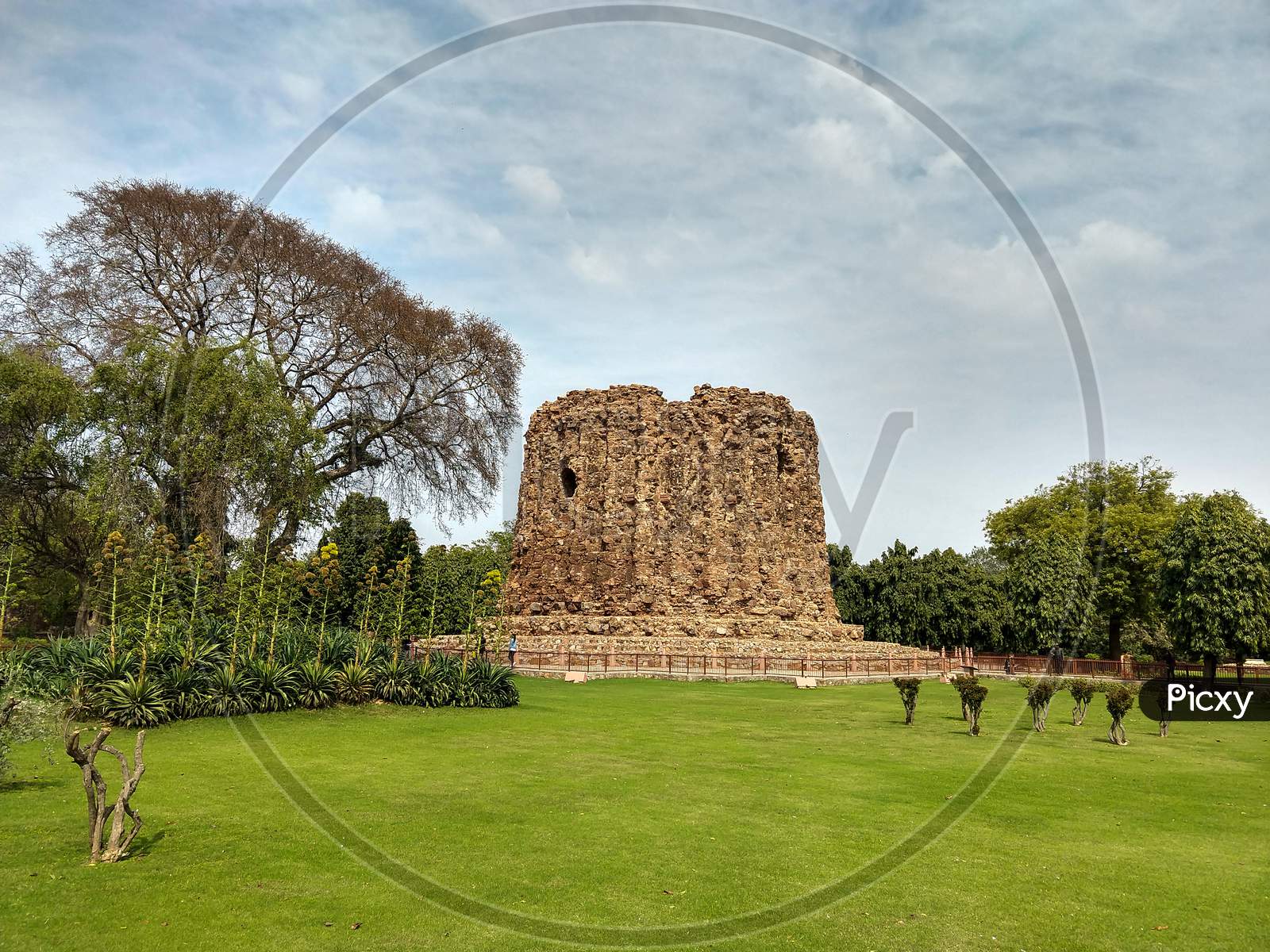 The remains of Alauddin Kilji's Alai Minar at Qutub Minar complex. Unfinished 1-story tower built during the Khalji dynasty to commemorate military victories.