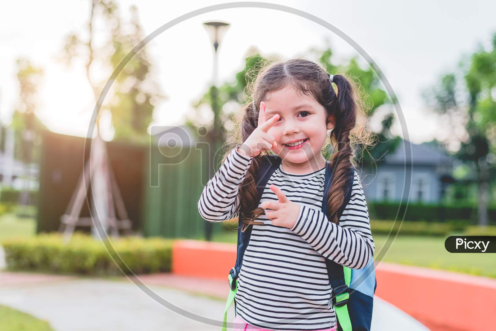 Happy Little Girl Enjoy Going To School. Back To School And Education Concept. Happy Life And Family Lifestyle Theme.
