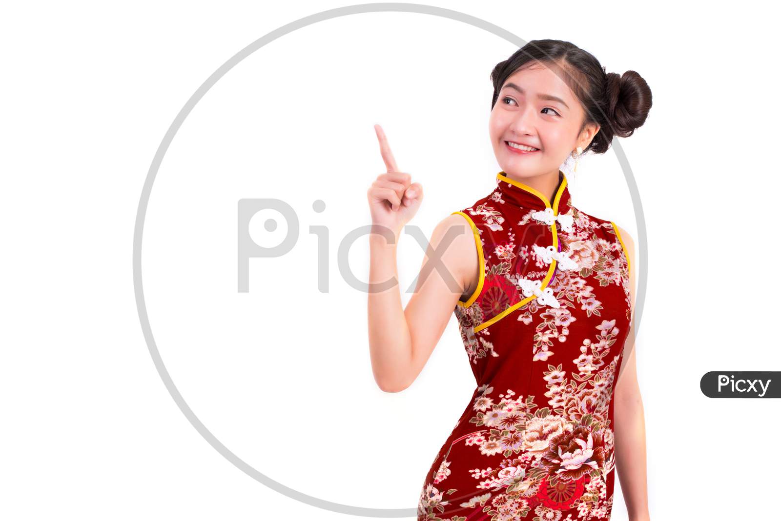Young Asian Beauty Woman Wearing Cheongsam And Pointing Beside Gesture In Chinese New Year Festival Event On Isolated White Background. Holiday And Lifestyle Concept. Qipao Dress Wearing