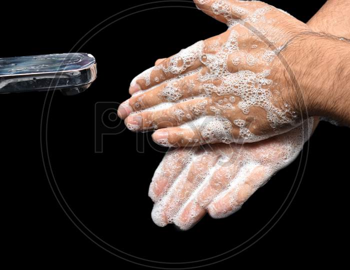 Man Washing Hands With Liquid Soap