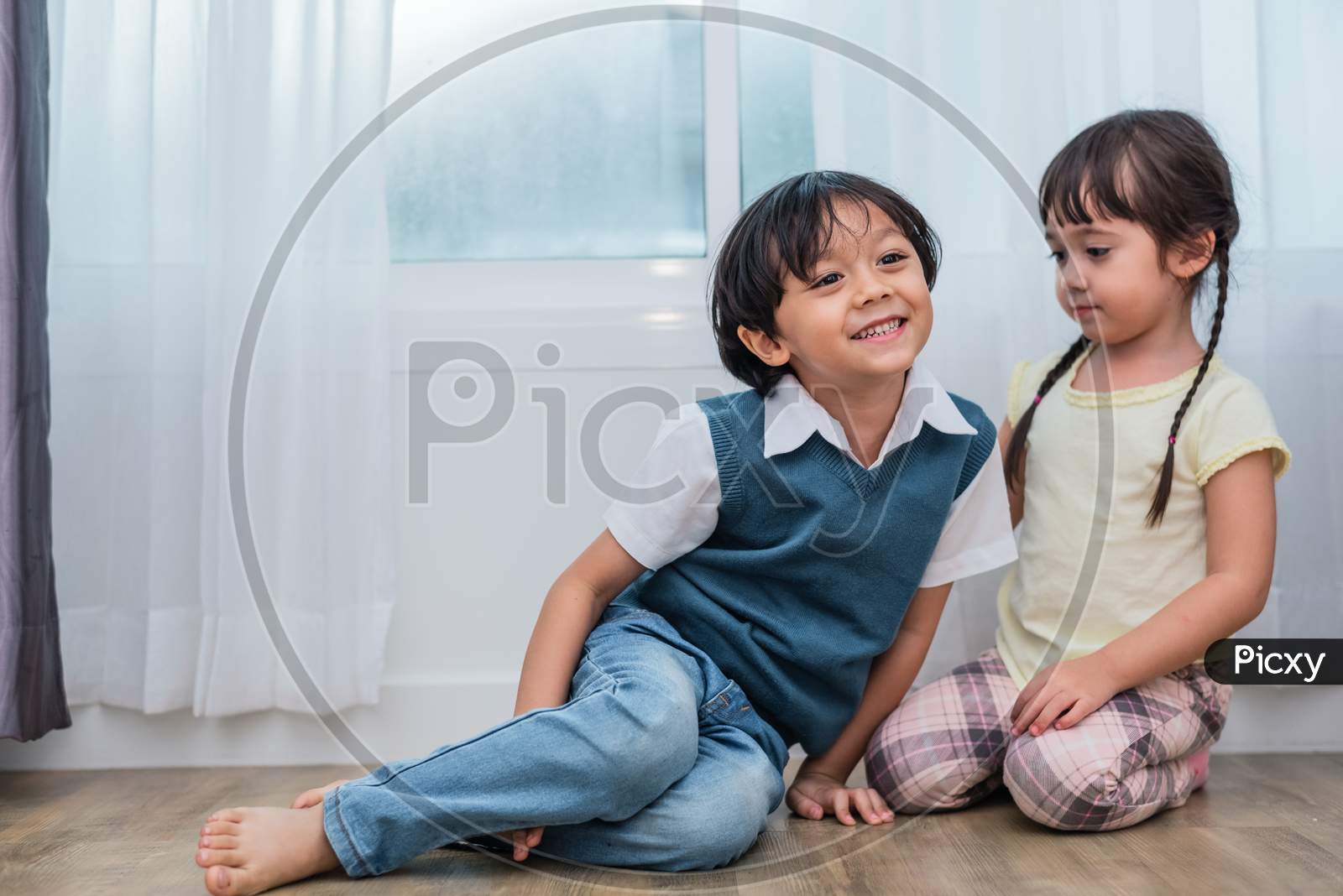 Two Caucasians Brother And Sister Portrait. Children And Kids Concept. People And Lifestyles Concept. Happy Family And Sibling Love Theme.