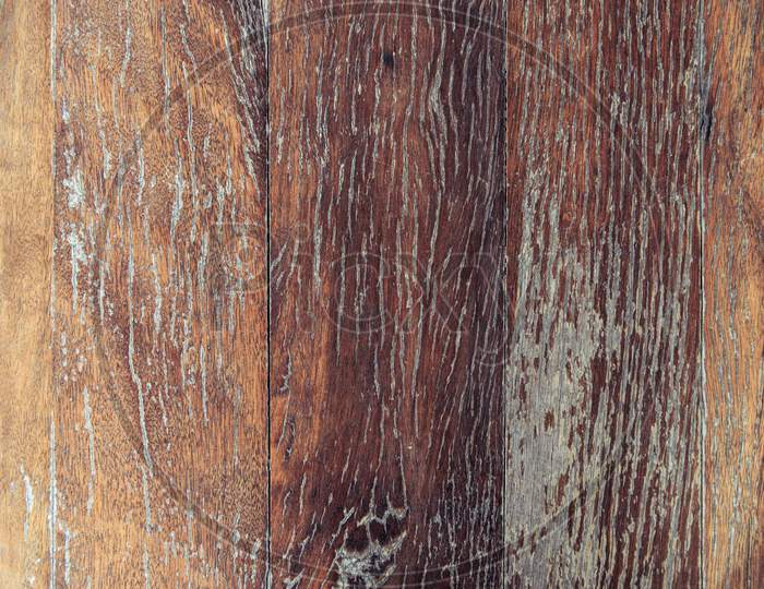 Closeup Of Old Red Brown Wooden Plank Texture Background. Wallpaper Backdrop. Abstract Wood Floor And Wall Structure. Top View Angle. Vertical Pattern