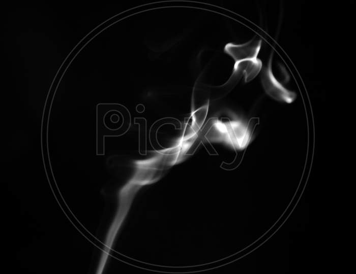 Close Up Of White Smoke On Black Background. Abstract And Texture Concept.
