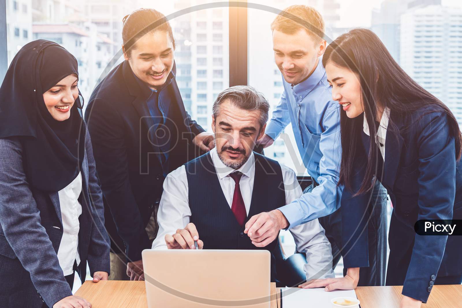 Group Of Multiethnic Business People Training By Executive Senior Boss In Modern Office With Laptop Computer. Startup Team Meeting And Brainstorming, Working People Having Conference Workshop Concept