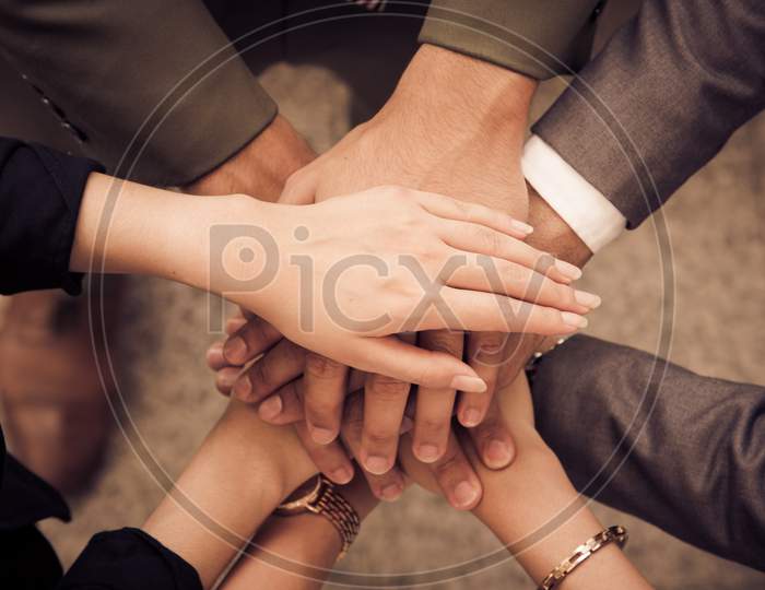 Business People Hands Assemble Corporate In Meeting And Teamwork Concept. Group Of Teamwork And Cooperation Theme. Together Teamwork