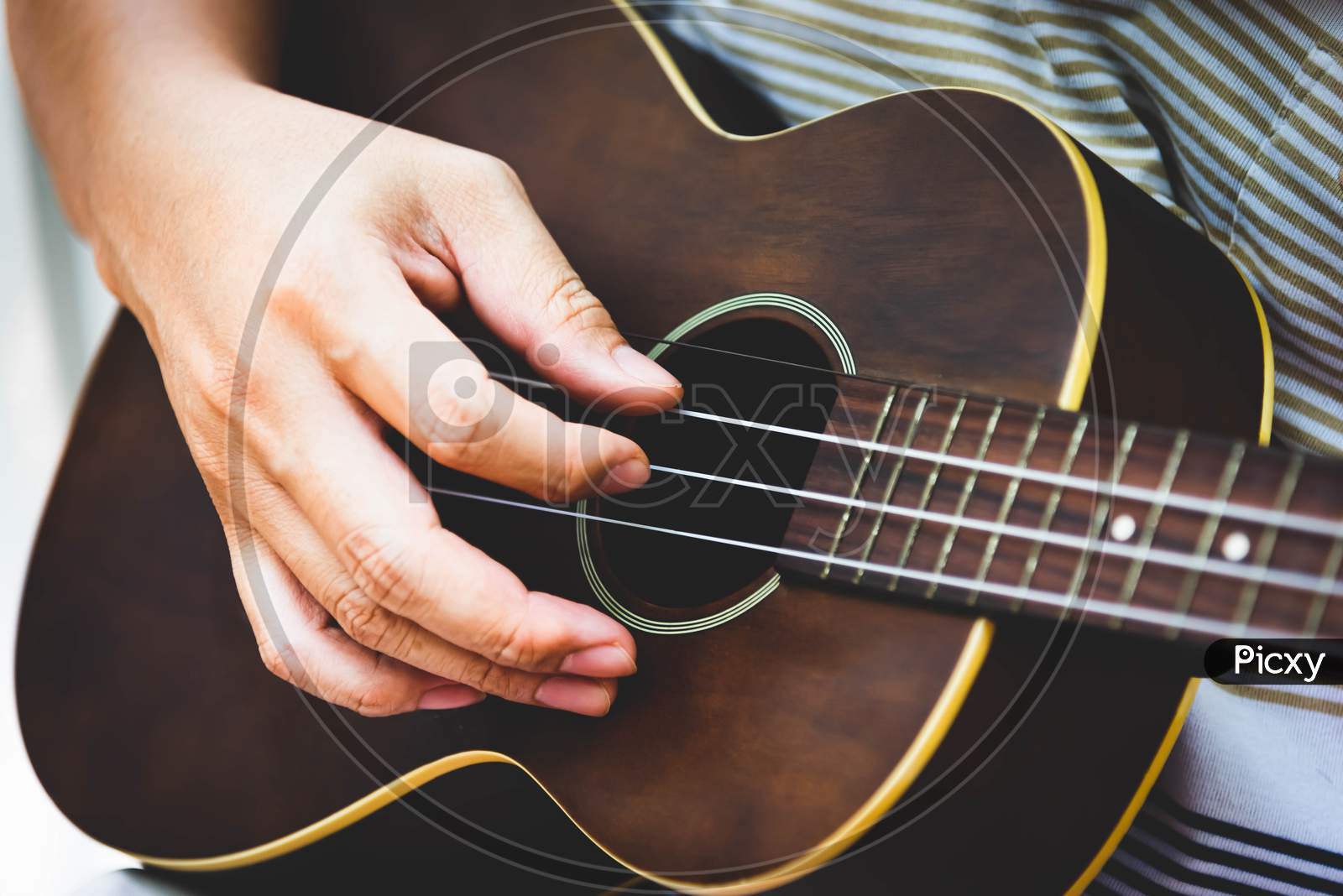 Image Of Closeup Of Guitarist Hand Playing Guitar Musical Instrument Concept Outdoors And Leisure Theme Selective Focus On Left Hand Vintage Country Folk Guitar With Music Singer Close Up Entertainer Hand Kf Picxy