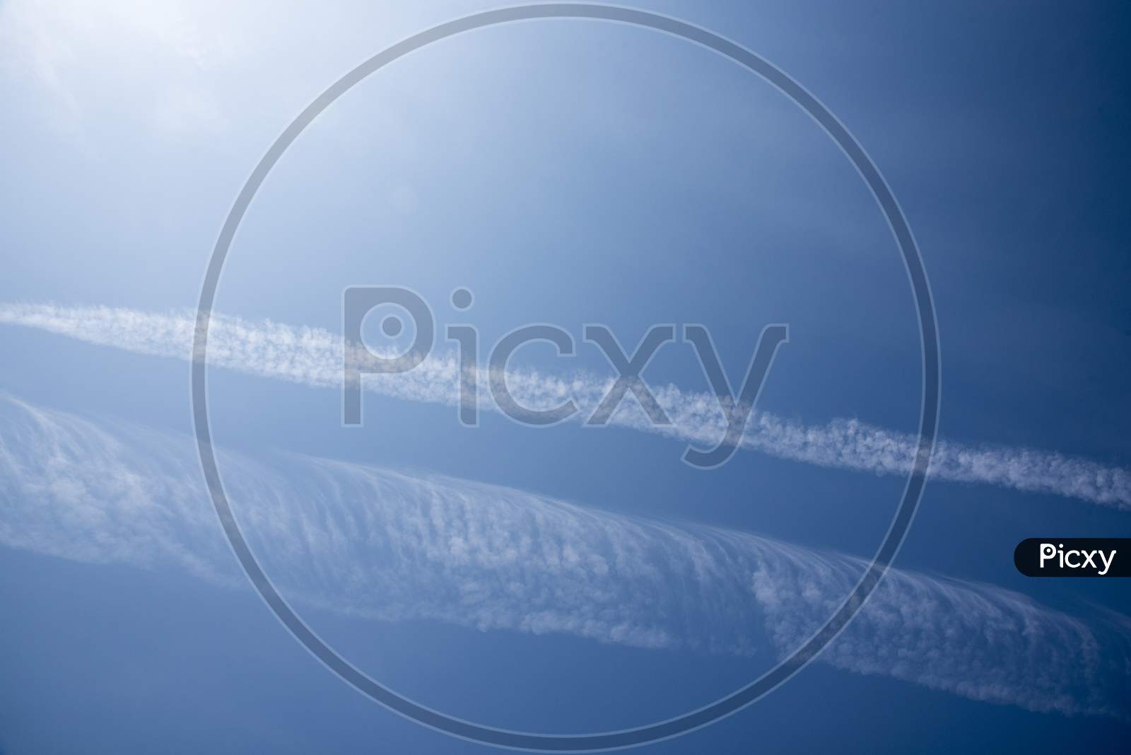 Blue Sky With Straight Cloud Stream And Smoke Background, Nature And Fog Concept