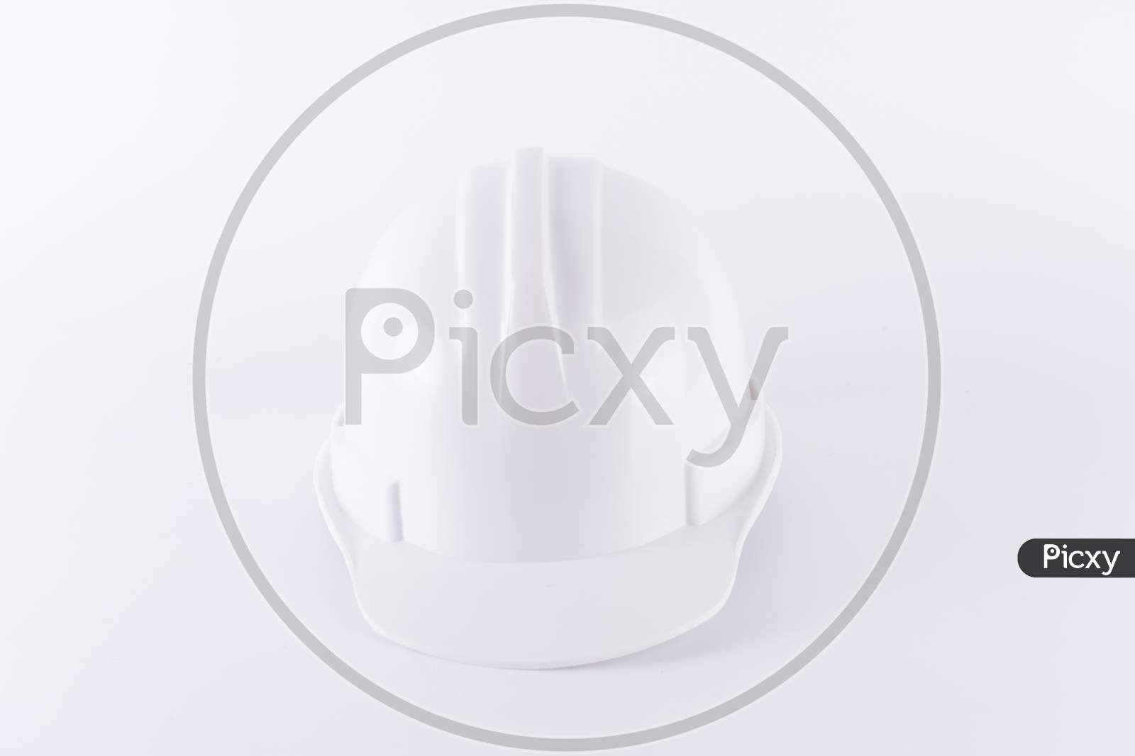 White Safety Helmet On White Background. Hard Hat And Thick Gloves On White Isolated Background. Safety Equipment Concept. Worker And Industrial Theme.