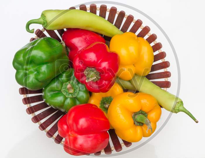 Fresh Bell Pepper or Capsicum with green Indian chili.