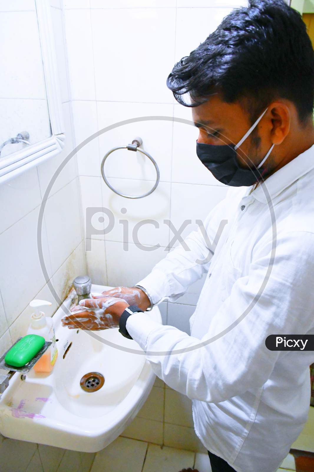 Washing hands rubbing with soap man for corona virus prevention, hygiene to stop spreading coronavirus. India