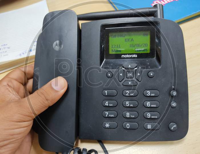 a lanline phone set which uses mobile sim to make and receive calls