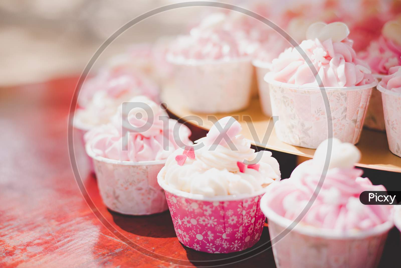 Pink Cup Cakes In Wedding Ceremony. Decoration And Celebration Concept. Food And Dessert Theme.