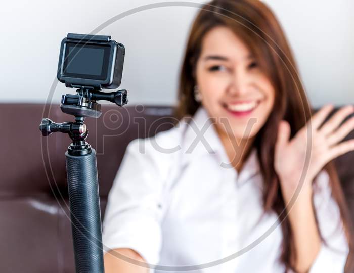 Closeup Of Action Camera With Professional Digital Content Creator Blogger Recording Video Blog Presentation Clip For Upload To Website As Coach And Tutor To Making For Popular Vlog And Master Class