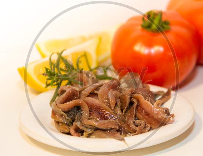 Pickled Anchovies With Rosemary Lemon Vinegar And Tomatoes