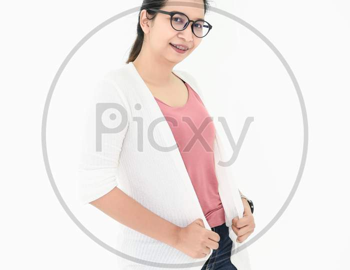 Asian Woman Posing With Casual Outfit And Eyeglasses In Happy Mood On White Isolated Background. People Beauty And Portrait Concept.