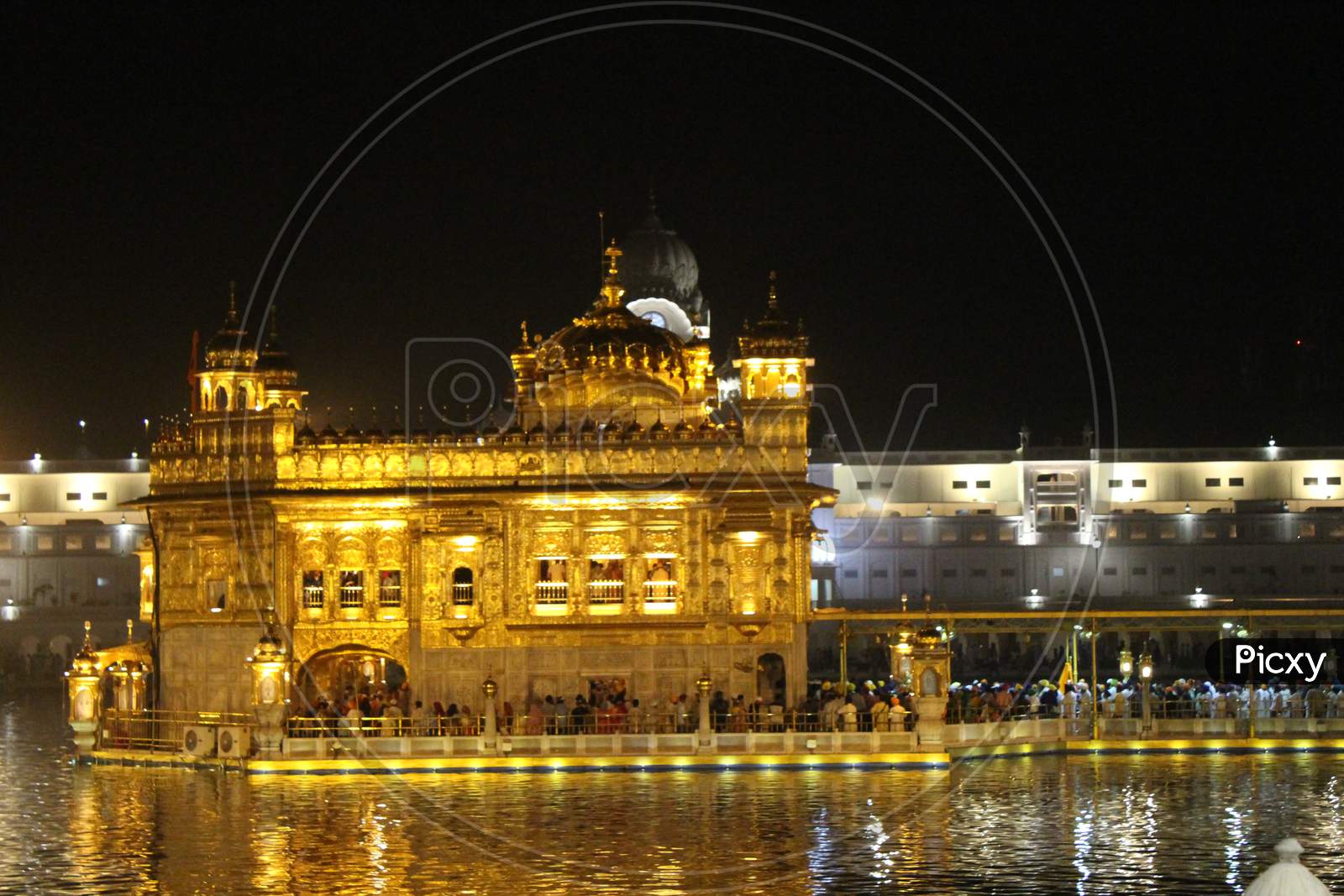 a view of The Golden Temple during the night