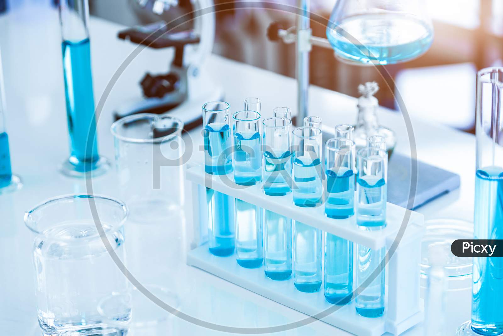 Laboratory Test Tubes And Solution With Stethoscope Background. Science And Medical Concept. Scientist Research And Analysis Biotechnology Concept