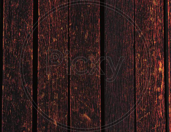 Burning Wood Background Texture. Material And Wallpaper Concept