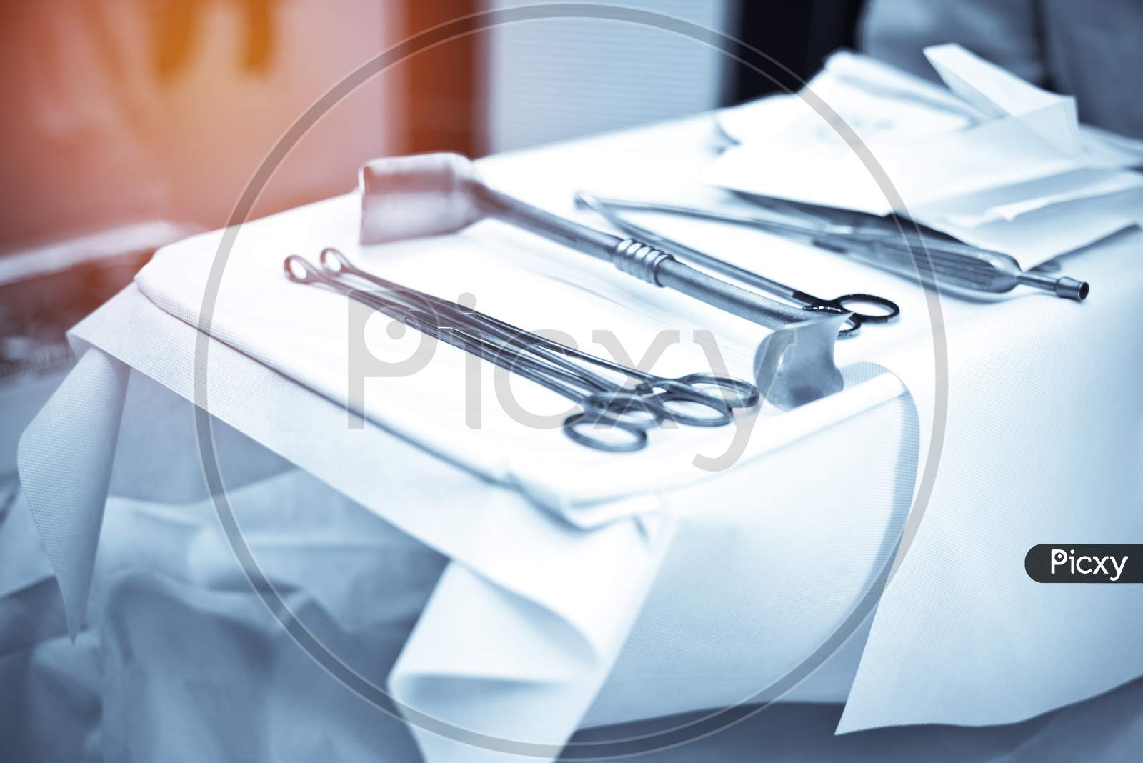 Surgery Instrument And Tools Set On White Sterile Fabric In Operating Room At Hospital. Medical And Healthcare Concept. Emergency And Life Rescue Concept. Operation Room Theme.