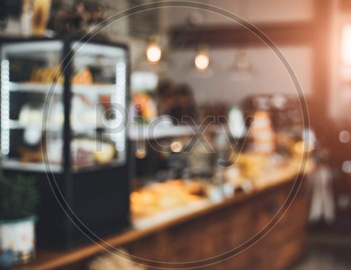 Blurry Background Of Bakery And Coffee Shop. Food And Restaurant Concept. Co Working Theme.
